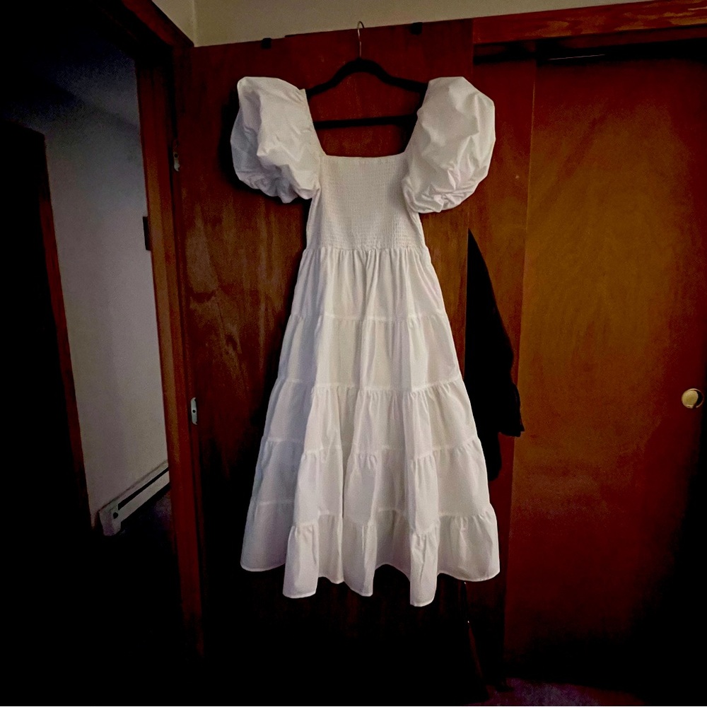 This dress was worn for 1 he on a cruise for pictures